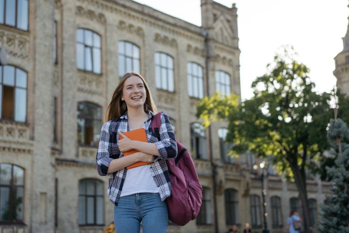 student front of Collage